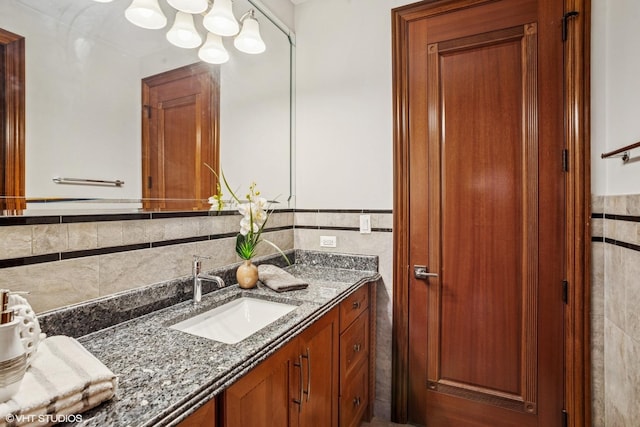 3832 W Chase Ave, Lincolnwood, IL 60712 - bathroom with vanity and tile walls