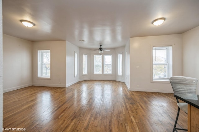 805 S Independence Blvd Unit 3, Chicago, IL 60624 - unfurnished room featuring hardwood / wood-style floors, baseboards, and ceiling fan