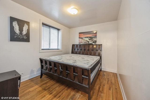805 S Independence Blvd Unit 3, Chicago, IL 60624 - bedroom with baseboards and wood finished floors