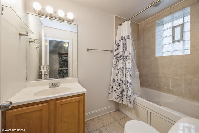 805 S Independence Blvd Unit 3, Chicago, IL 60624 - bathroom featuring tile patterned flooring, vanity, toilet, shower / tub combo with curtain, and baseboards