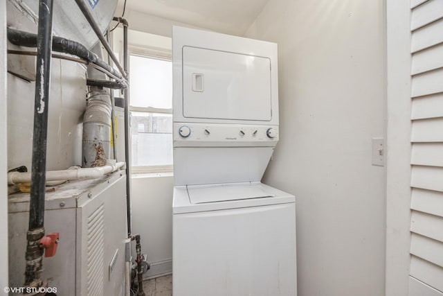 805 S Independence Blvd Unit 3, Chicago, IL 60624 - laundry room featuring estacked washer and dryer