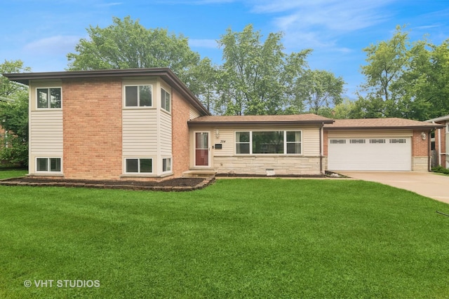 354 W Pleasant Hill Blvd, Palatine, IL 60067 - tri-level home with driveway, an attached garage, a front lawn, and stone siding