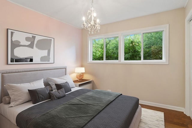 354 W Pleasant Hill Blvd, Palatine, IL 60067 - bedroom with wood finished floors and a chandelier