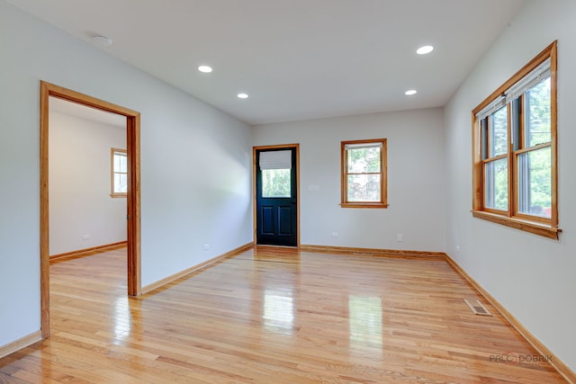 26371 N Elmwood Ave, Mundelein, IL 60060 - unfurnished room featuring light wood finished floors, recessed lighting, and a smoke detector