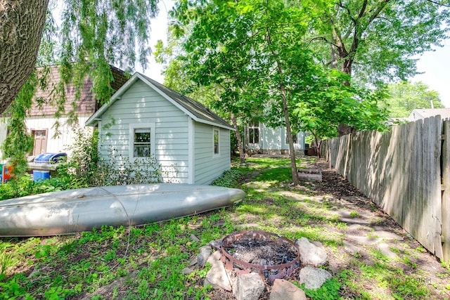 26371 N Elmwood Ave, Mundelein, IL 60060 - view of yard with an outdoor fire pit