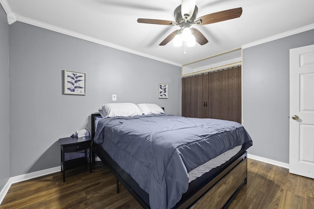 215 Cypress Dr, Streamwood, IL 60107 - bedroom featuring crown molding, baseboards, wood finished floors, a closet, and ceiling fan