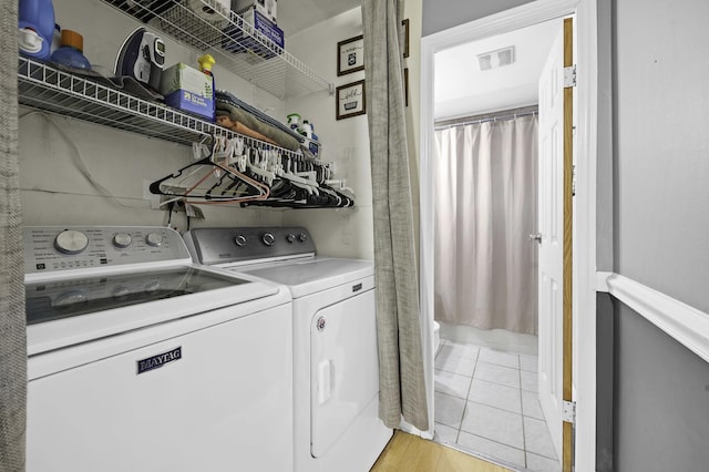 215 Cypress Dr, Streamwood, IL 60107 - laundry area featuring washing machine and dryer