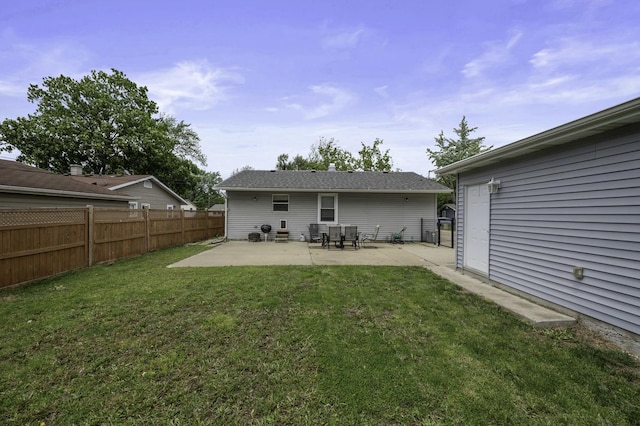 215 Cypress Dr, Streamwood, IL 60107 - rear view of house with a patio