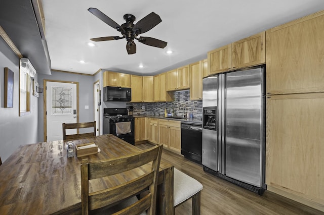 215 Cypress Dr, Streamwood, IL 60107 - kitchen featuring black appliances, light brown cabinetry, dark wood-style floors, a sink, and recessed lighting