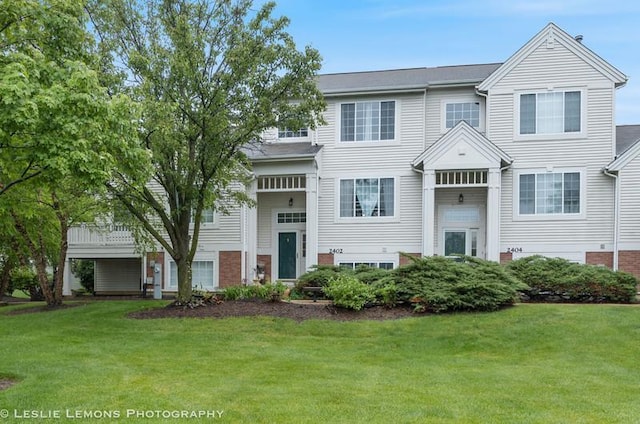 2402 Oakfield Ct, Aurora, IL 60503 - view of front facade featuring a front yard