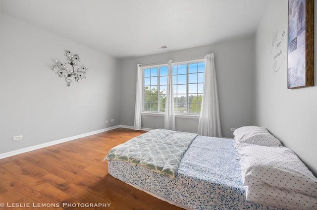 2402 Oakfield Ct, Aurora, IL 60503 - bedroom with wood finished floors and baseboards