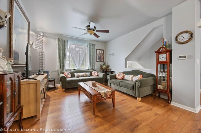 2402 Oakfield Ct, Aurora, IL 60503 - living area with light wood finished floors, ceiling fan, and baseboards