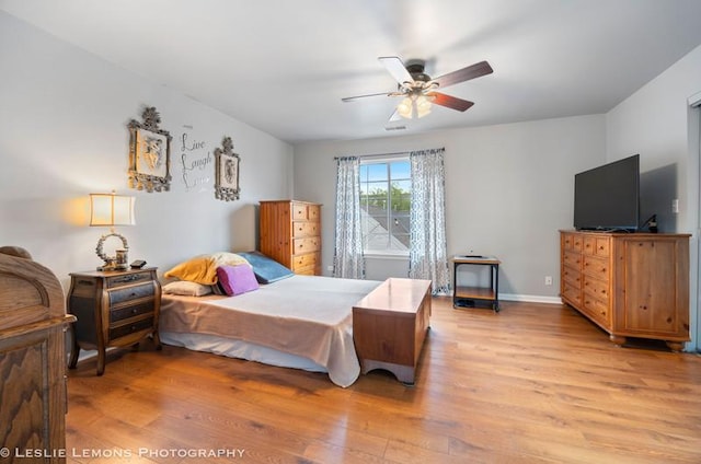 2402 Oakfield Ct, Aurora, IL 60503 - bedroom featuring light wood-type flooring, baseboards, and a ceiling fan