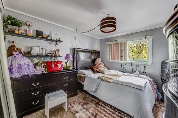 426 Greentree Ln, Bolingbrook, IL 60440 - carpeted bedroom featuring crown molding