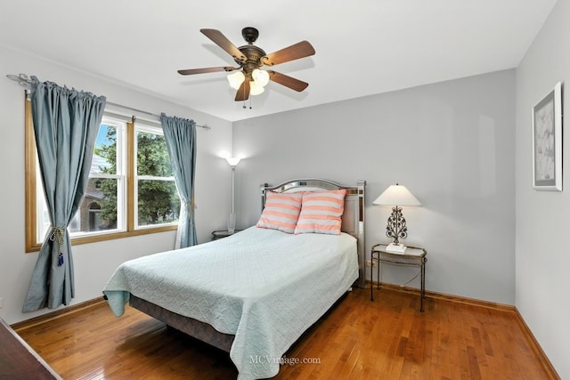 3835 Huntington Blvd, Hoffman Estates, IL 60192 - bedroom with wood finished floors and ceiling fan