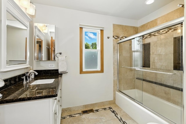 3835 Huntington Blvd, Hoffman Estates, IL 60192 - bathroom with double vanity, shower / bath combination with glass door, tile patterned floors, inlaid floor details, and recessed lighting