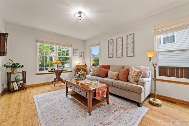 2937 Arbor Ln, Aurora, IL 60502 - living area featuring light wood-type flooring and baseboards