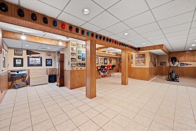 2937 Arbor Ln, Aurora, IL 60502 - finished below grade area featuring wood walls, a drop ceiling, a wainscoted wall, and recessed lighting
