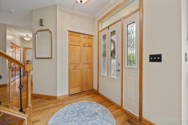 2937 Arbor Ln, Aurora, IL 60502 - entryway with plenty of natural light, light wood-style flooring, and stairway