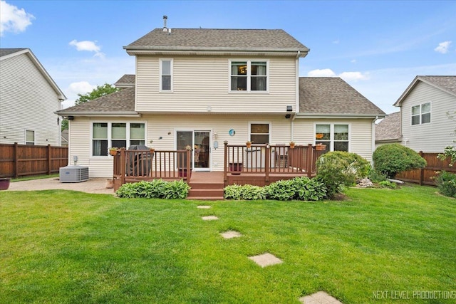 2937 Arbor Ln, Aurora, IL 60502 - back of property featuring a fenced backyard, a wooden deck, and roof with shingles