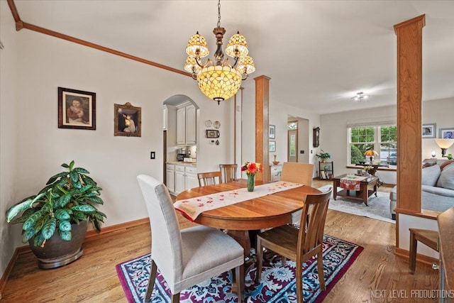 2937 Arbor Ln, Aurora, IL 60502 - dining space featuring light wood finished floors and a chandelier