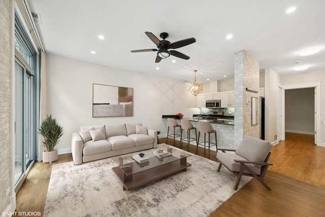 23 N Racine Ave Unit 405, Chicago, IL 60607 - living room featuring light wood-style flooring, recessed lighting, and a ceiling fan