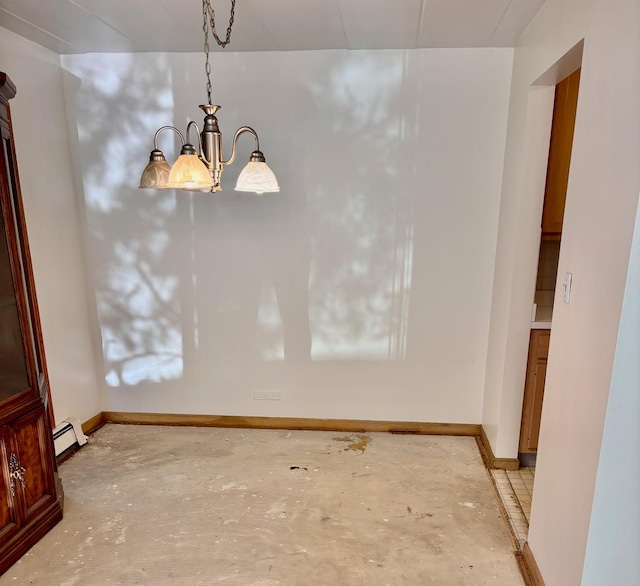 1015 Deerfield Rd Unit 132, Deerfield, IL 60015 - unfurnished room with a chandelier, a baseboard radiator, and unfinished concrete floors