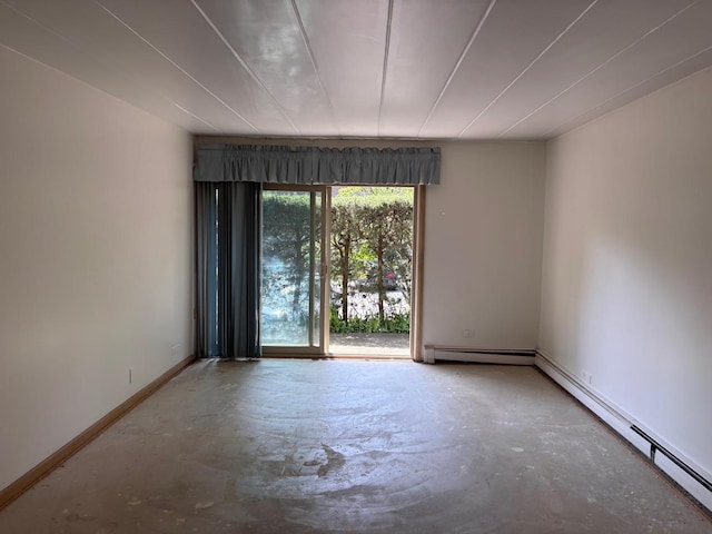 1015 Deerfield Rd Unit 132, Deerfield, IL 60015 - spare room with concrete flooring and a baseboard radiator