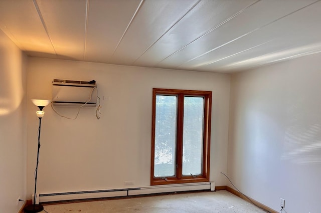 1015 Deerfield Rd Unit 132, Deerfield, IL 60015 - unfurnished room with a baseboard heating unit, an AC wall unit, and concrete floors