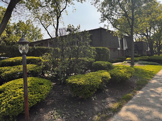1015 Deerfield Rd Unit 132, Deerfield, IL 60015 - view of property exterior with mansard roof