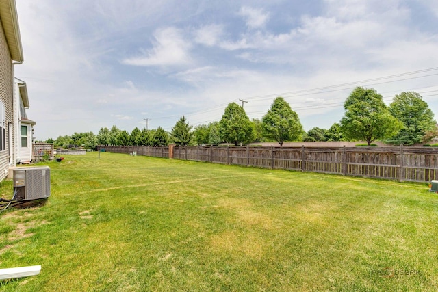 3452 Birch Ln, Naperville, IL 60564 - back of house with a lawn and central AC