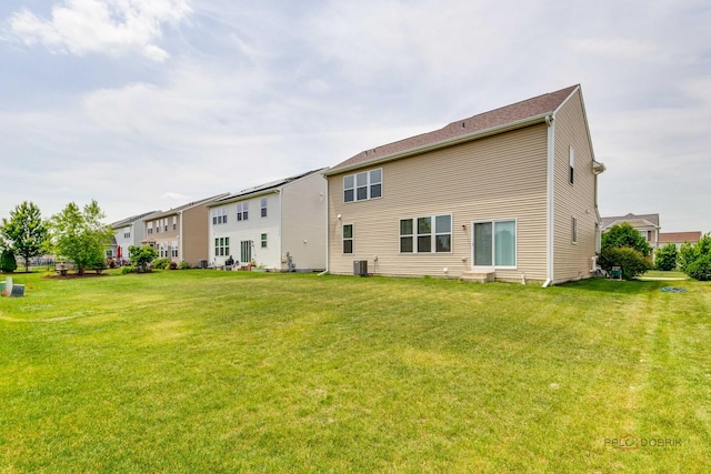 3452 Birch Ln, Naperville, IL 60564 - rear view of house with a lawn and central AC