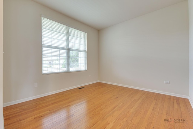 3452 Birch Ln, Naperville, IL 60564 - unfurnished room featuring light wood-type flooring and baseboards