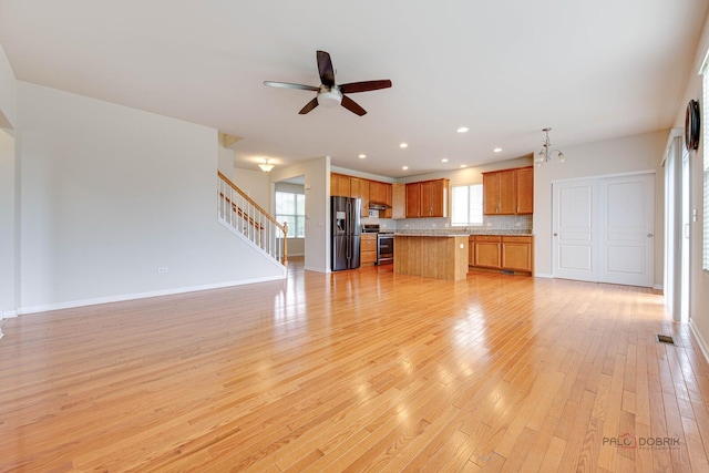 3452 Birch Ln, Naperville, IL 60564 - unfurnished living room with ceiling fan, light wood-style flooring, stairway, baseboards, and recessed lighting
