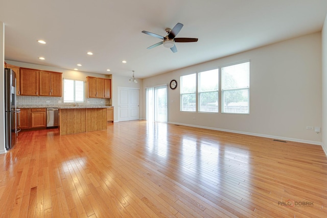 3452 Birch Ln, Naperville, IL 60564 - unfurnished living room featuring ceiling fan, recessed lighting, light wood-style flooring, and baseboards