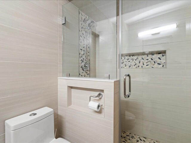 14542 S Mustang Dr, Homer Glen, IL 60491 - laundry room featuring cabinet space and washing machine and clothes dryer