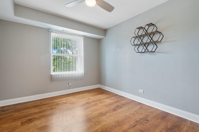 810 N River Rd Unit 3A, Mount Prospect, IL 60056 - spare room featuring baseboards, wood finished floors, and ceiling fan