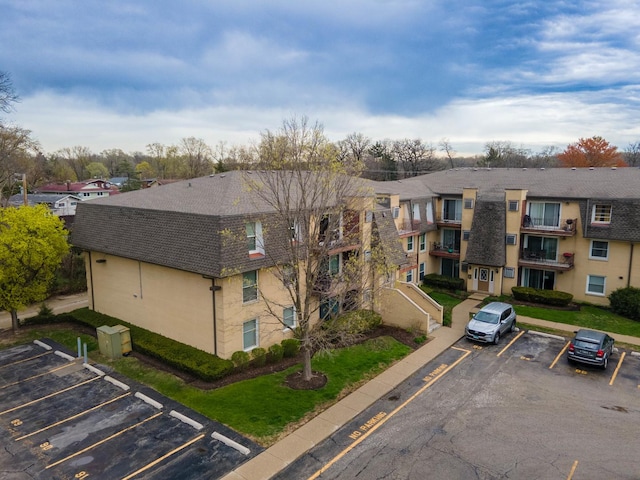 810 N River Rd Unit 3A, Mount Prospect, IL 60056 - view of building exterior with uncovered parking