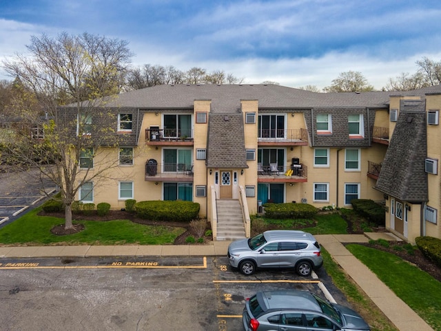 810 N River Rd Unit 3A, Mount Prospect, IL 60056 - view of building exterior with uncovered parking