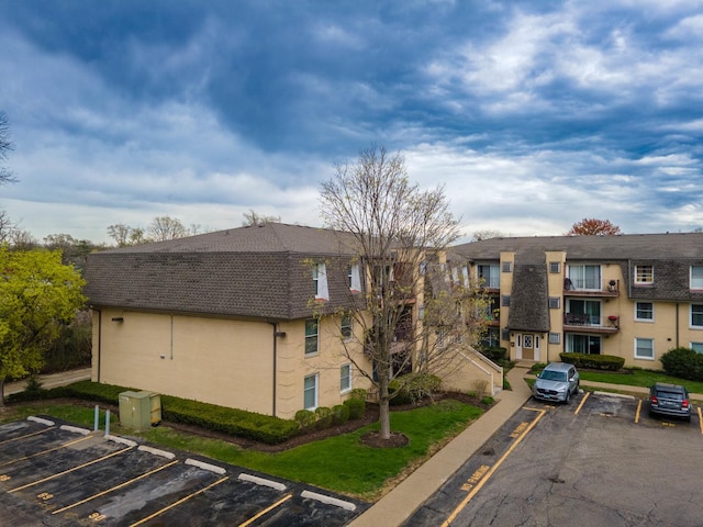 810 N River Rd Unit 3A, Mount Prospect, IL 60056 - view of property featuring uncovered parking