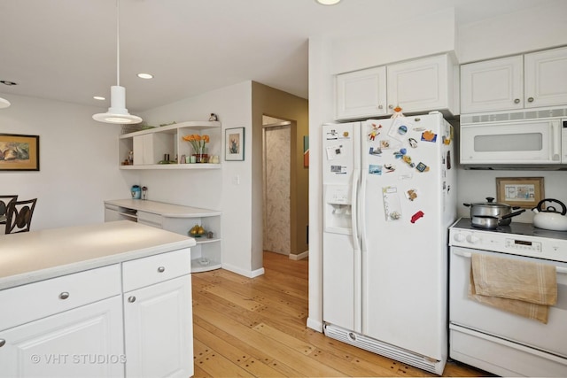 30 W Wimbolton Dr Unit 30, Mount Prospect, IL 60056 - kitchen with white appliances, light wood-type flooring, white cabinets, recessed lighting, and light countertops