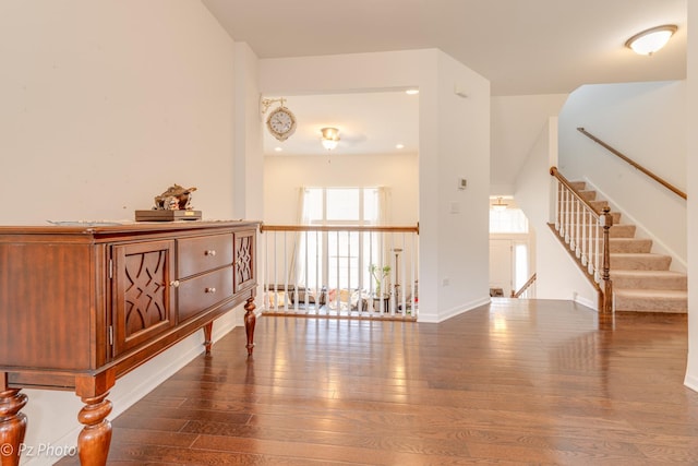 336 Sype Dr, Carol Stream, IL 60188 - corridor with dark wood-style floors, stairs, and baseboards
