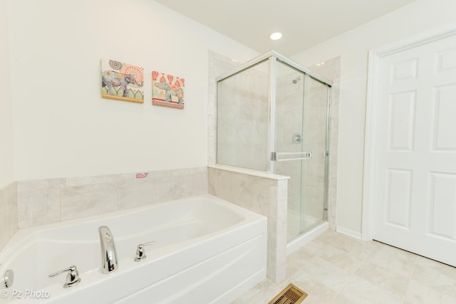 336 Sype Dr, Carol Stream, IL 60188 - full bathroom with a garden tub, a shower stall, recessed lighting, and tile patterned flooring