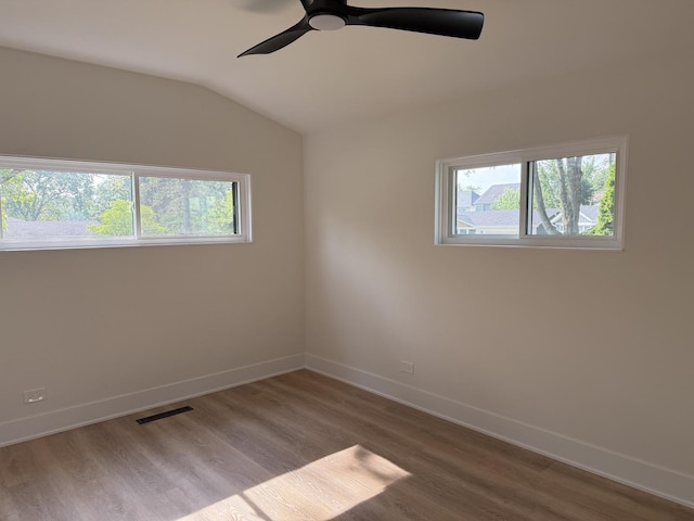 222 S Maple St, Palatine, IL 60067 - unfurnished room featuring healthy amount of natural light, wood finished floors, ceiling fan, and lofted ceiling