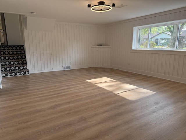 222 S Maple St, Palatine, IL 60067 - empty room featuring light wood finished floors, stairway, and a smoke detector