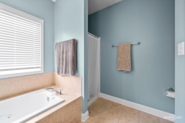 3880 W Nettle Creek Dr, Morris, IL 60450 - bathroom with a bath, a shower stall, tile patterned flooring, and baseboards