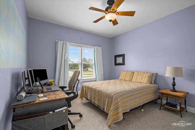 3880 W Nettle Creek Dr, Morris, IL 60450 - bedroom with light colored carpet, an office area, a ceiling fan, and baseboards