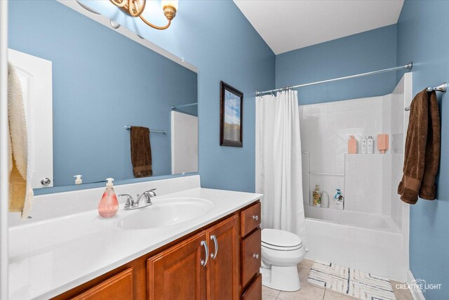 3880 W Nettle Creek Dr, Morris, IL 60450 - full bathroom with vanity, shower / bath combo with shower curtain, tile patterned floors, and toilet