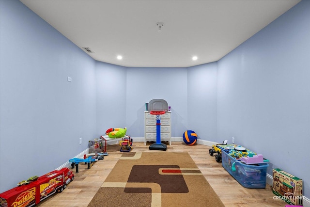 3880 W Nettle Creek Dr, Morris, IL 60450 - exercise area featuring wood finished floors, recessed lighting, and baseboards