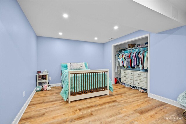 3880 W Nettle Creek Dr, Morris, IL 60450 - bedroom with wood finished floors, recessed lighting, baseboards, and a closet